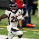 Denver Broncos running back Melvin Gordon (25) runs for a touchdown during the second half of an NFL football game Thursday, Oct. 1, 2020, in East Rutherford, N.J.
